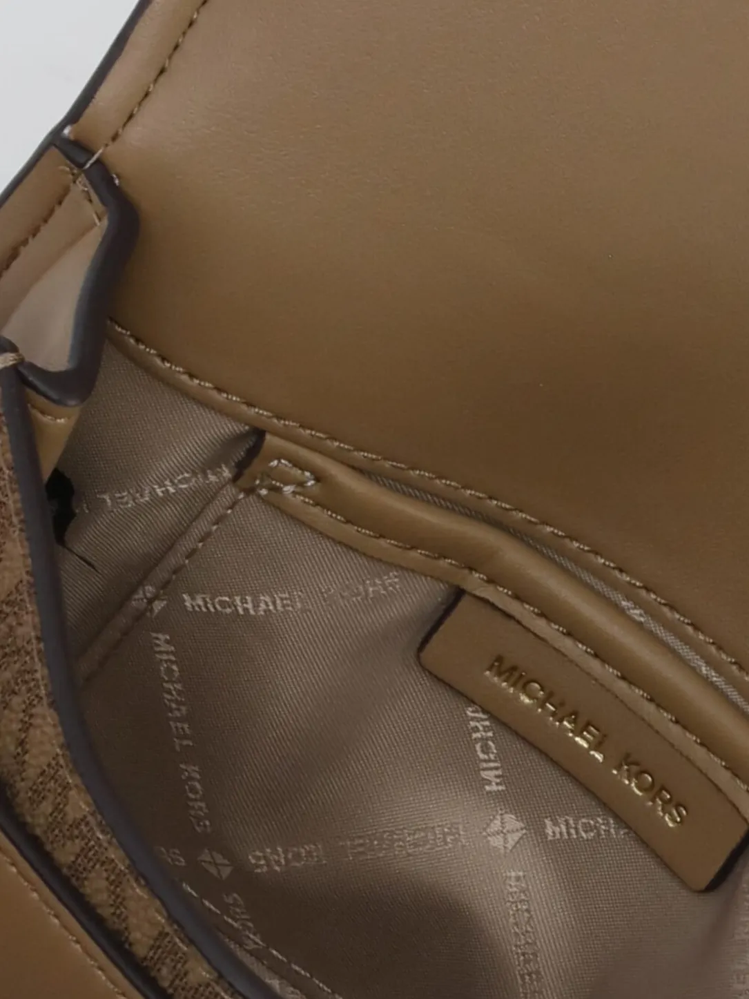 Borsa Michael Kors in cotone spalmato con monogram MK all over