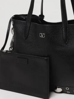 Borsa Nellcôte Valentino Garavani in pelle martellata con borchie ed occhielli