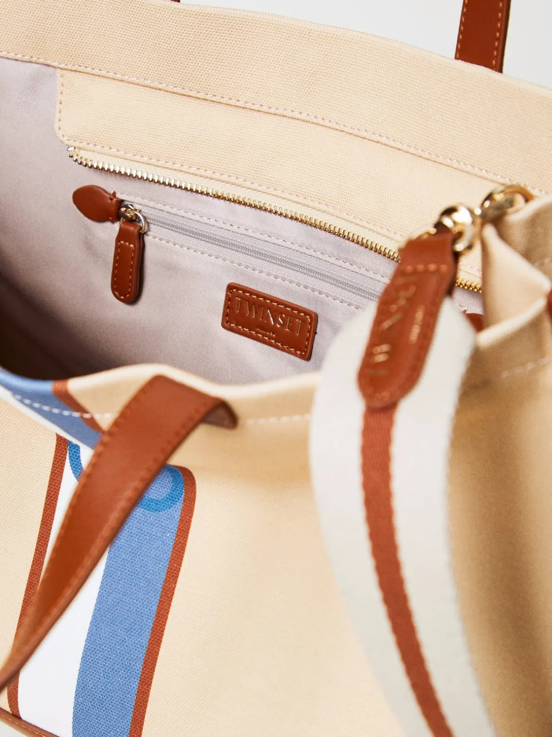 Borsa Oval T Twinset in canvas con stampa a righe