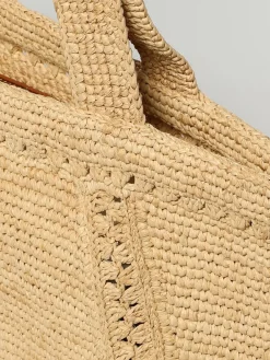 Borsa Patou in rafia crochet con logo ricamato