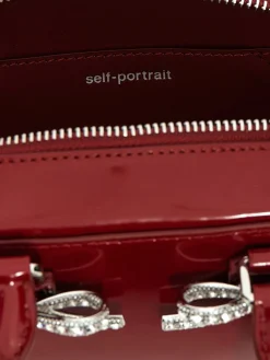 Borsa Self-Portrait in pelle spazzolata con fiocchi gioiello