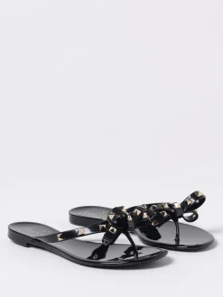 Infradito Rockstud Valentino Garavani in gomma con fiocco