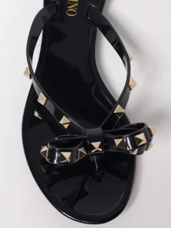 Infradito Rockstud Valentino Garavani in gomma con fiocco