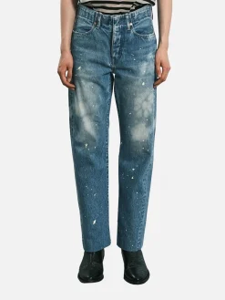 Jeans baggy Tanaka con schizzi di pittura