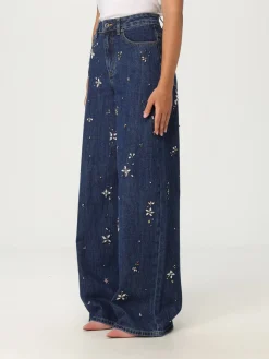 Jeans Self-Portrait in denim con strass applicati