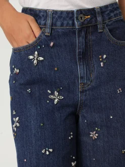 Jeans Self-Portrait in denim con strass applicati