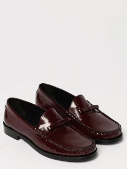 Mocassino Stuart Weitzman in pelle spazzolata con fiocco