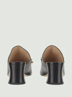 Mules Chloé in pelle con charms