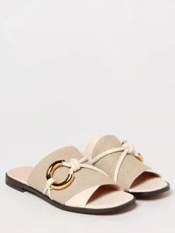 Mules Coccinelle in canvas di lino e pelle