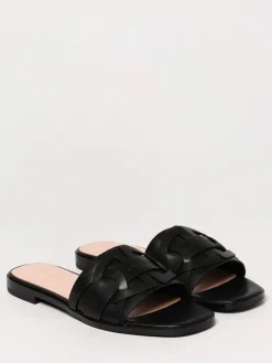 Mules Coccinelle in pelle intrecciata