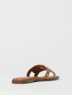 Mules Twinset in pelle con borchie