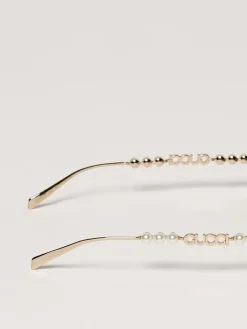 Occhiali da sole GG1922S Gucci in metallo con perle applicate