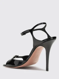 Sandalo Adut Amina Muaddi in vernice con fibbia gioiello