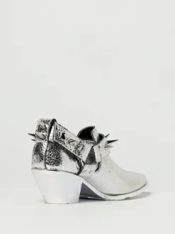 Stivaletto Junya Watanabe in pelle laminata con borchie